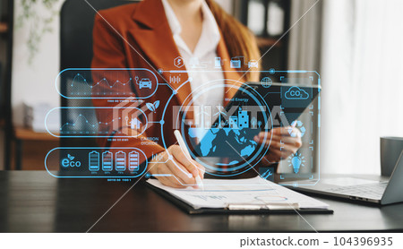 Business working with reduce CO2 concept with icons, global warming such as reforest green factory recycle and zero carbon dioxide emission concept. with VR icon at office. 104396935