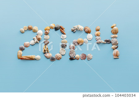 2024 made by seashells. New year holidays in tropics. 104403034