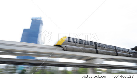 Elevated monorail train fast move on rail. Public transit monorail. Modern mass transit. Rail transportation. Driverless straddle monorail. Monorail technology. Rapid transit in city. Urban transport. 104403128