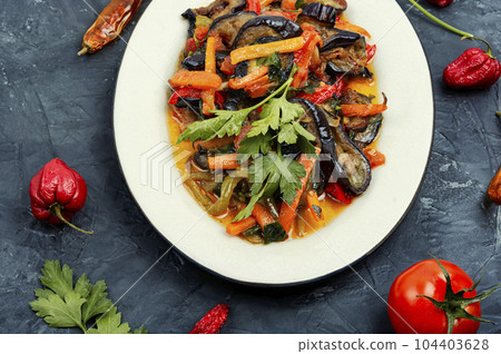 Aubergine saute, fragrant vegetable dish. 104403628
