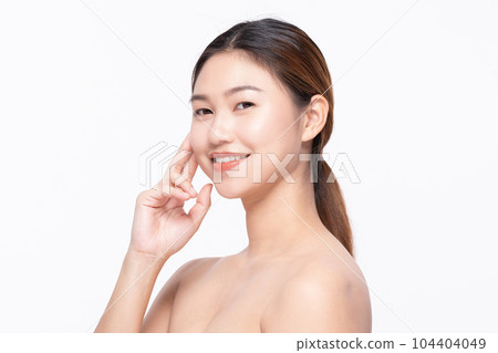 Beautiful Asian woman touching soft cheek smile with clean and fresh skin Happiness and cheerful with positive emotional,isolated on white background,Beauty Self Care and Cosmetics Concept Beautiful Asian woman touching soft cheek smile with clean and fresh skin Happiness and cheerful with positive emotional,isolated on white background,Beauty Self Care and Cosmetics Concept 104404049