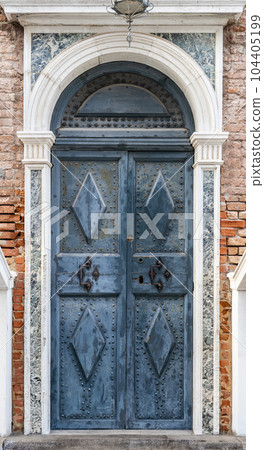 Old wooden entrance door. 104405199