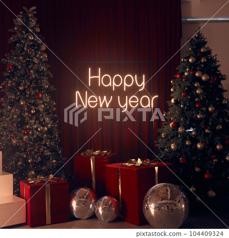 Gifts under the Christmas tree, red boxes with ribbons. New Year's interior decoration, two Christmas trees, between them the inscription happy new year. High quality photo Gifts under the Christmas tree, red boxes with ribbons. New Year's interior decoration, two Christmas trees, between them the inscription happy new year. High quality photo 104409324