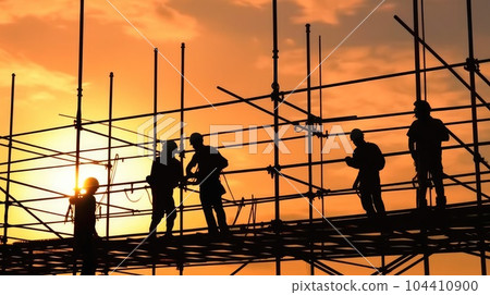 Silhouette of construction worker checking project at building site background. Silhouette of construction worker checking project at building site background. 104410900