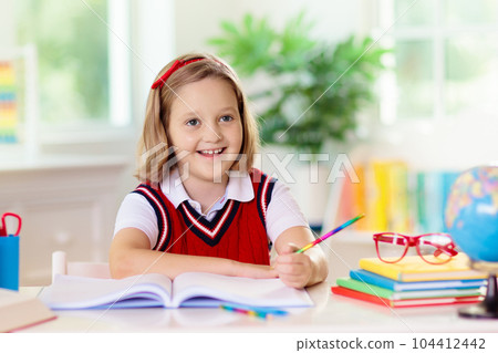 Kids doing homework. Children go back to school. Kids doing homework. Children go back to school. 104412442