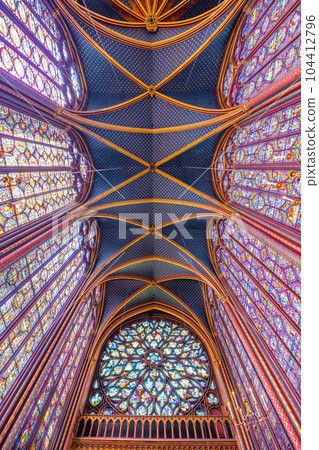 Monumental interior of Sainte-Chapelle with stained glass windows, upper level of royal chapel in the Gothic style. Palais de la Cite, Paris, France Monumental interior of Sainte-Chapelle with stained glass windows, upper level of royal chapel in the Gothic style. Palais de la Cite, Paris, France 104412796