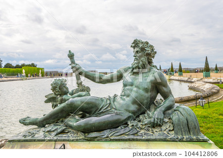 Rhone statue at The Water Garden in the Gardens of Versailles, Chateau Versailles near Paris, France. Rhone statue at The Water Garden in the Gardens of Versailles, Chateau Versailles near Paris, France. 104412806