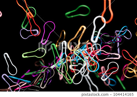 Fashion Safety Pin brooch pour fall down, explosion in air. Many safety pin big size colorful splash fly in group floating. Black background isolated freeze motion Fashion Safety Pin brooch pour fall down, explosion in air. Many safety pin big size colorful splash fly in group floating. Black background isolated freeze motion 104414165