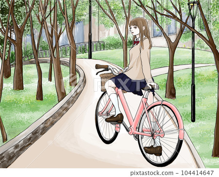 High school girl on a bicycle turning around in the park High school girl on a bicycle turning around in the park 104414647