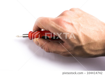 man of man that hold a screwdriver with handle rubber of red color on the white background man of man that hold a screwdriver with handle rubber of red color on the white background 104414742
