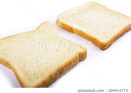 two slices of bread for toast on a white background two slices of bread for toast on a white background 104414773