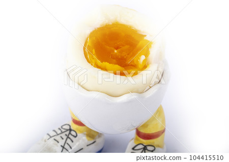 boiled egg open half in stand in the form of legs isolate 104415510