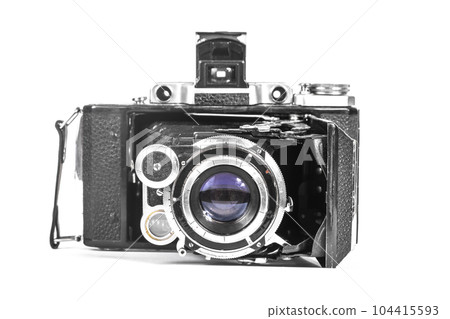 Antique camera with an accordion lens isolate 104415593