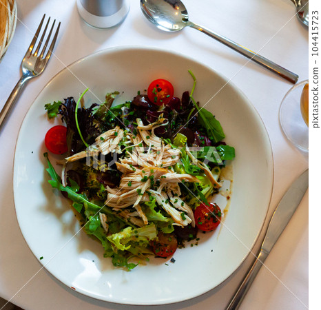 Chicken and cherry tomato salad 104415723