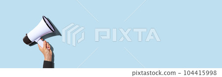 Attention and announcement concept with a megaphone 104415998