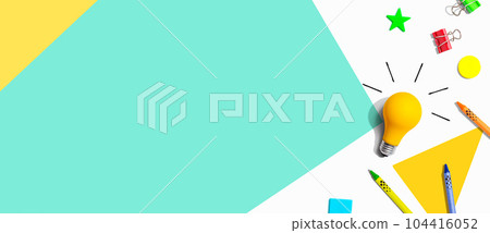 Idea light bulb with school supplies - flat lay Idea light bulb with school supplies - flat lay 104416052