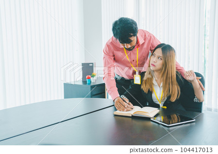 Boss or supervisor touching female employee's shoulder Causing young employees to resist because they are uncomfortable and afraid of being sexually abused. Concept of sexual harassment in the Boss or supervisor touching female employee's shoulder Causing young employees to resist because they are uncomfortable and afraid of being sexually abused. Concept of sexual harassment in the 104417013