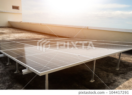 Technology Light Solar Panels Solar Cells on Rooftop with Sun Overlight Day no House Building with Blue Sky Background,Home Energy Sun Plant environment Eco Modern,Electricity economy Solar Cell Power Technology Light Solar Panels Solar Cells on Rooftop with Sun Overlight Day no House Building with Blue Sky Background,Home Energy Sun Plant environment Eco Modern,Electricity economy Solar Cell Power 104417291