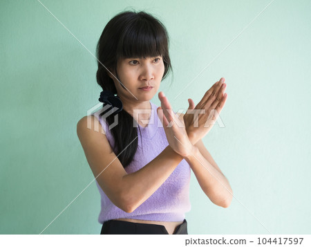International Women is Day Concept,Woman gesturing Break The Bias with Stressed Face,Diverse Adult Authentic Black Hair,Black Eyes,Skin Tan Asian Thailand,Shapely Girl,Young female Standing on Wall. International Women is Day Concept,Woman gesturing Break The Bias with Stressed Face,Diverse Adult Authentic Black Hair,Black Eyes,Skin Tan Asian Thailand,Shapely Girl,Young female Standing on Wall. 104417597