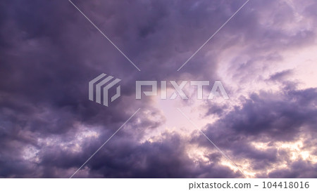 dark clouds in the evening sky 104418016