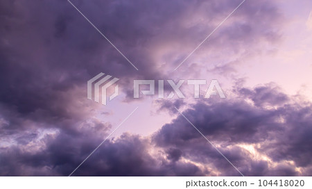 dark clouds in the evening sky 104418020