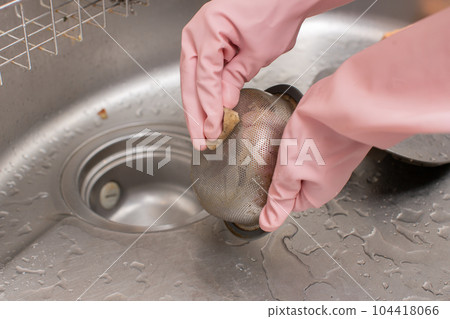 cleaning dirty drains cleaning dirty drains 104418066