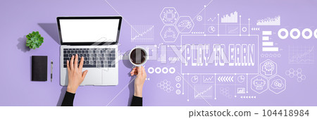 Play to Earn theme with person using laptop computer 104418984