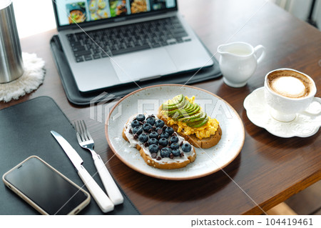 breakfast Toast Omlet and avocodo and blueberry 104419461