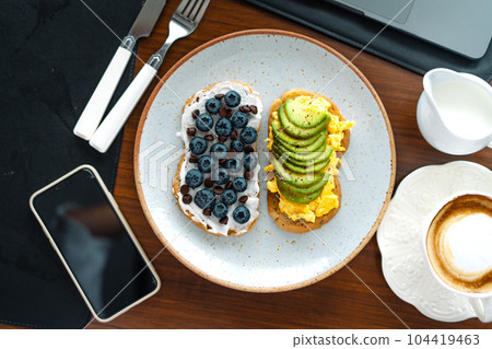 breakfast Toast Omlet and avocodo and blueberry 104419463