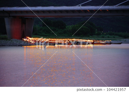 Composite photo of bonfires at the Nagaragawa cormorant fishing grounds Composite photo of bonfires at the Nagaragawa cormorant fishing grounds 104421957