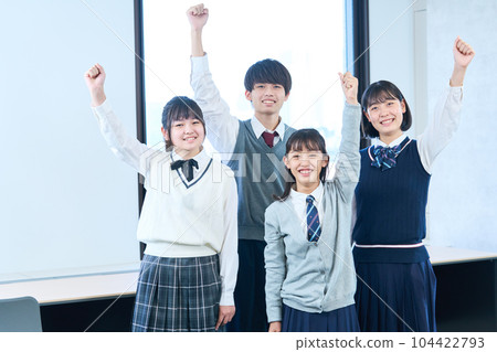 Junior high school students enthusiastically taking a group photo Junior high school students enthusiastically taking a group photo 104422793