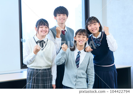 Junior high school students enthusiastically taking a group photo Junior high school students enthusiastically taking a group photo 104422794