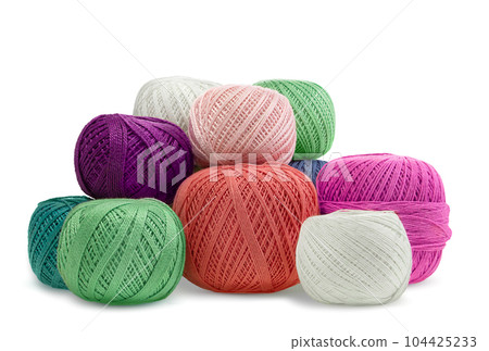 Multicolored woolen balls, yarn on white isolated background. Handmade, hobby, knitting. Copy space Multicolored woolen balls, yarn on white isolated background. Handmade, hobby, knitting. Copy space 104425233
