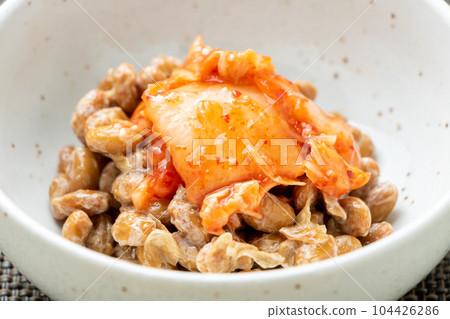 Kimchi natto. Natto arrangement, Chinese cabbage kimchi topping. 104426286