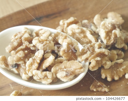 walnuts on a plate walnuts on a plate 104426677