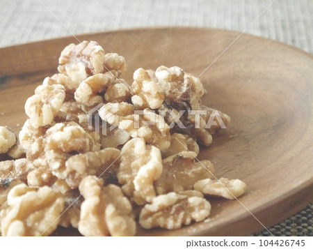 wooden plate and walnut wooden plate and walnut 104426745
