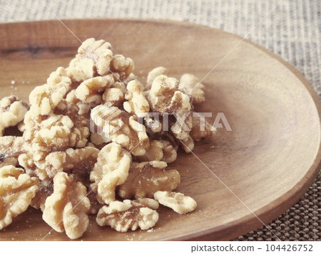 wooden plate and walnut wooden plate and walnut 104426752