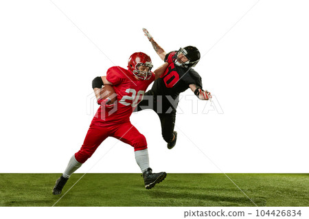 Men, american football players in motions, playing, training against white background. Game preparation Men, american football players in motions, playing, training against white background. Game preparation 104426834