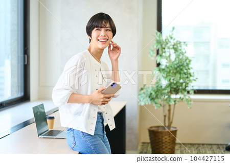 Young woman in the office Telework Remote work Young woman in the office Telework Remote work 104427115