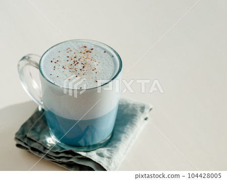 Blue pea latte or blue matcha latte with copy space Blue pea latte or blue matcha latte with copy space 104428005