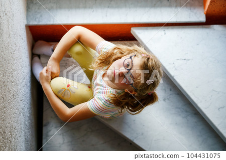 Lonely Upset Little Preschool Girl at Home. Sad Child Alone. Emotional Stress of Children, School, and Family Problems. 104431075