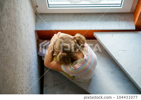 Lonely Upset Little Preschool Girl at Home. Sad Child Alone. Emotional Stress of Children, School, and Family Problems. 104431077