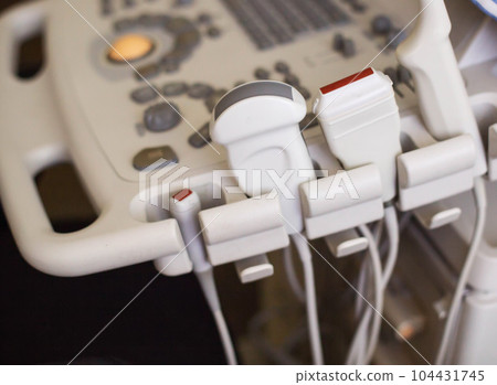 Ultrasonic sensors on ultrasound machines of various types in medicine. Ultrasound examination in gynecology, cardiology and surgery. 104431745