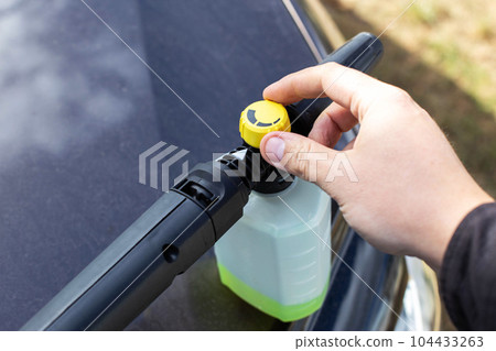 Nozzle foam generator for a sink of a high pressure. car chemicals, shampoo concentrate. Car care. copy space for text 104433263