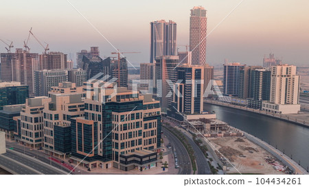 Bay Square district timelapse with mixed use and low rise complex office buildings located in Business Bay in Dubai Bay Square district timelapse with mixed use and low rise complex office buildings located in Business Bay in Dubai 104434261