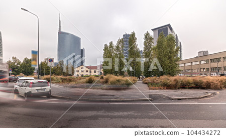 Panorama showing skyscrapers and towers from park with green lawn timelapse in Milan Panorama showing skyscrapers and towers from park with green lawn timelapse in Milan 104434272