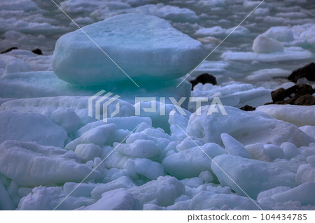 Drift ice washed ashore 104434785