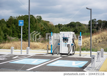EV charging stand parking lot EV charging stand parking lot 104435116