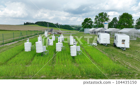 Science station scientific monitoring measurement respiration wheat common agriculture field Triticum aestivum soil scientist working technology work earth technological carbon dioxide oxide oxygen 104435150