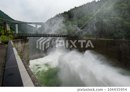 Okuchichibu Water discharge from Takizawa Dam and suspension bridge Okuchichibu Water discharge from Takizawa Dam and suspension bridge 104435954